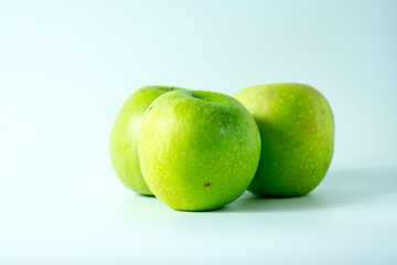 Three green apples
