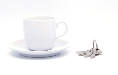 White coffee cup and keys