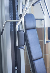 Gym exercise weights machine