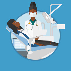 Patient and doctor at dentist office.