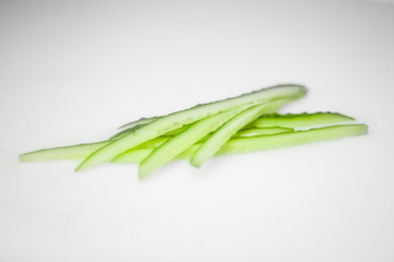 cucumber slices on white background