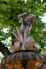 Pigeons on a fountain in park. In Split, Croatia. 