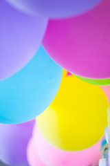 Colorful party balloon blur for background.