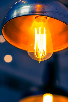 Tungsten lamp bulb, old vintage design style.
