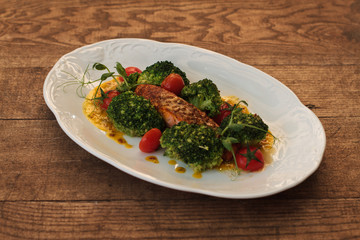 Grilled fish fillet with BBQ vegetables and sauce