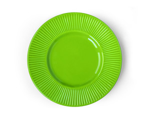 Top view of contemporary green ceramic empty plate isolated on white background. Lime green