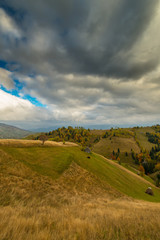 Fototapeta premium Idyllic autumn scenery in remote mountain area in Transylvania