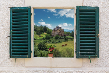 Fototapeta na wymiar View of the rural landscape through the open window