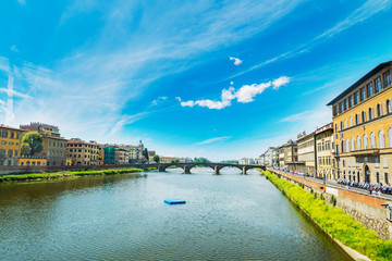 Fototapeta premium Arno banks seen from Ponte Vecchio in Florence