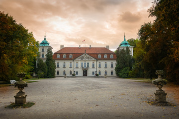 Fototapeta na wymiar Back view of Radziwill family palace of Nieborow, in baroque style, surrounded by a french garden.