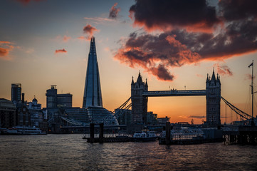 Fototapeta na wymiar Tower bridge and the sky London skyline at sunset in London, England