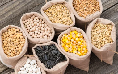 Rolgordijnen bags with cereal grains (oat, barley, wheat, corn, beans, peas, soy, sunflower) © tutye