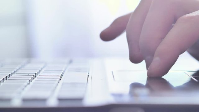 Men entering credit card information into an on-line shopping site.