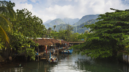Fototapeta na wymiar Fishing village on the island in Southeast Asia.