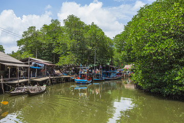 Fototapeta na wymiar Fishing village on the island in Southeast Asia.