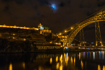 Fototapeta na wymiar Long exposure night view of Dom Lui­s I Bridge in Porto, Portugal