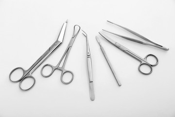 Flat lay of medical instruments on white background