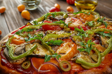 Tasty homemade pizza on table
