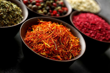 Different spices in bowls, closeup