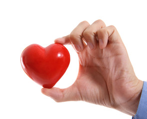Male hand holding red heart on white background