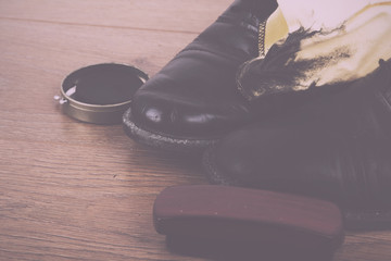 Shoes and cleaning equipment on a wooden floor Vintage Retro Fil