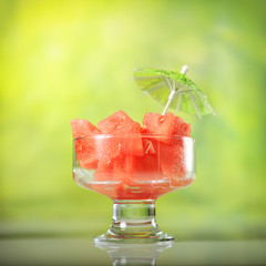 Refreshing watermelon dessert on a green background