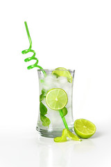 Refreshing cold mojito drink with fresh lime slices and ice