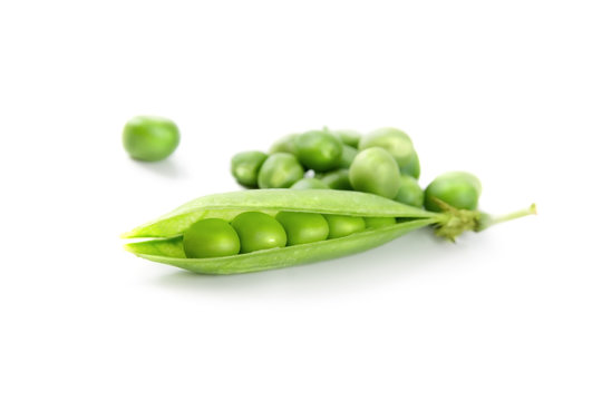 Fresh green peas vegetable closeup isolated on white