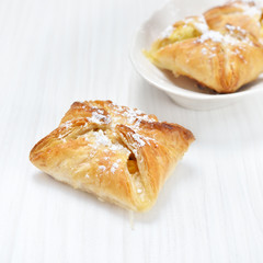 Puff pastry on the wooden white table