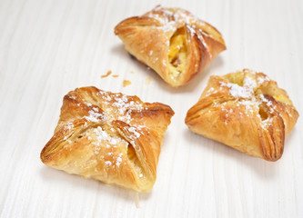 Puff pastry on the wooden white table