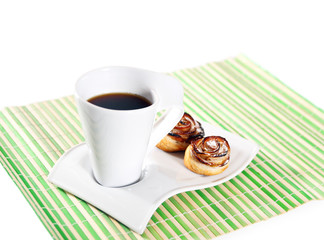 cup of hot coffee and cakes for breakfast