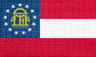 Flag of Georgia state brick wall texture backdrop