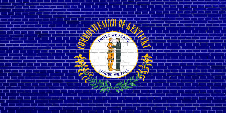Flag of Kentucky on brick wall texture background