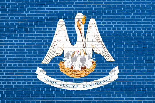 Flag of Louisiana on brick wall texture background