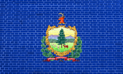 Flag of Vermont on brick wall texture background