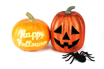 Halloween pumpkin lantern and spider isolated on white background