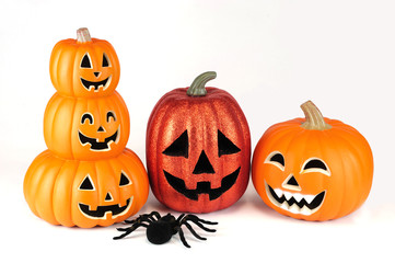 Halloween pumpkin lantern and spider isolated on white background