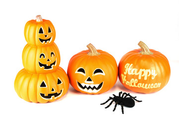Halloween pumpkin lantern and spider isolated on white background