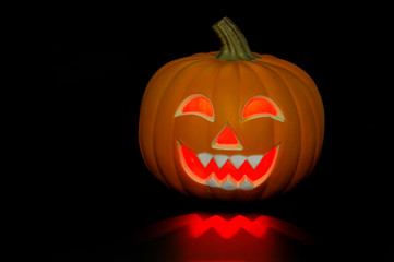 pumpkin lantern for Halloween glowing in dark
