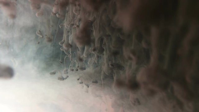 Creative Ink In Water. Cosmic interstellar concept with macro ink in water  effect looking something more astronomical. 