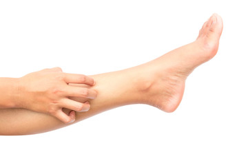 Woman hand scratching on feet with white backgroud for healthy c