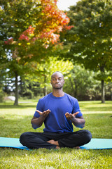 young man exercising yoga