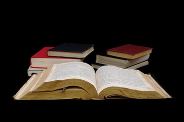 Open book isolated on a black background