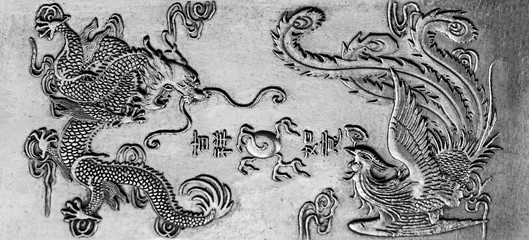 Dragon art of chinese style on a silver plate handmade.