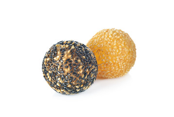 fried mung bean with white and black sessame ball on white backg