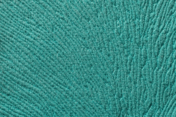 turquoise background from soft textile material. Fabric with natural texture.
