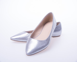 shoe. Silver colour fashion woman shoes on a background.