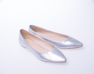 shoe. Silver colour fashion woman shoes on a background.