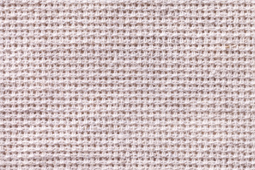 White textile background closeup. Structure of the fabric macro