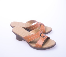 shoe. Brown colour fashion woman shoes on a background.